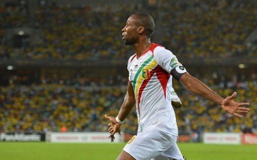 Mali's midfielder Seydou Keita (R) celebrates after scoring a goal against South Africa on February 2, 2013 in Durban